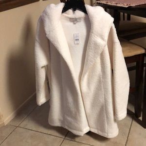 Cozy warm sherpa coat. Brand new with tags. Color is more of an off white
